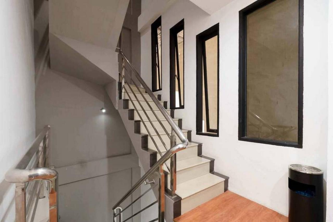 Pulauberayan Jotel Guest House Mitra Reddoorz מראה חיצוני תמונה