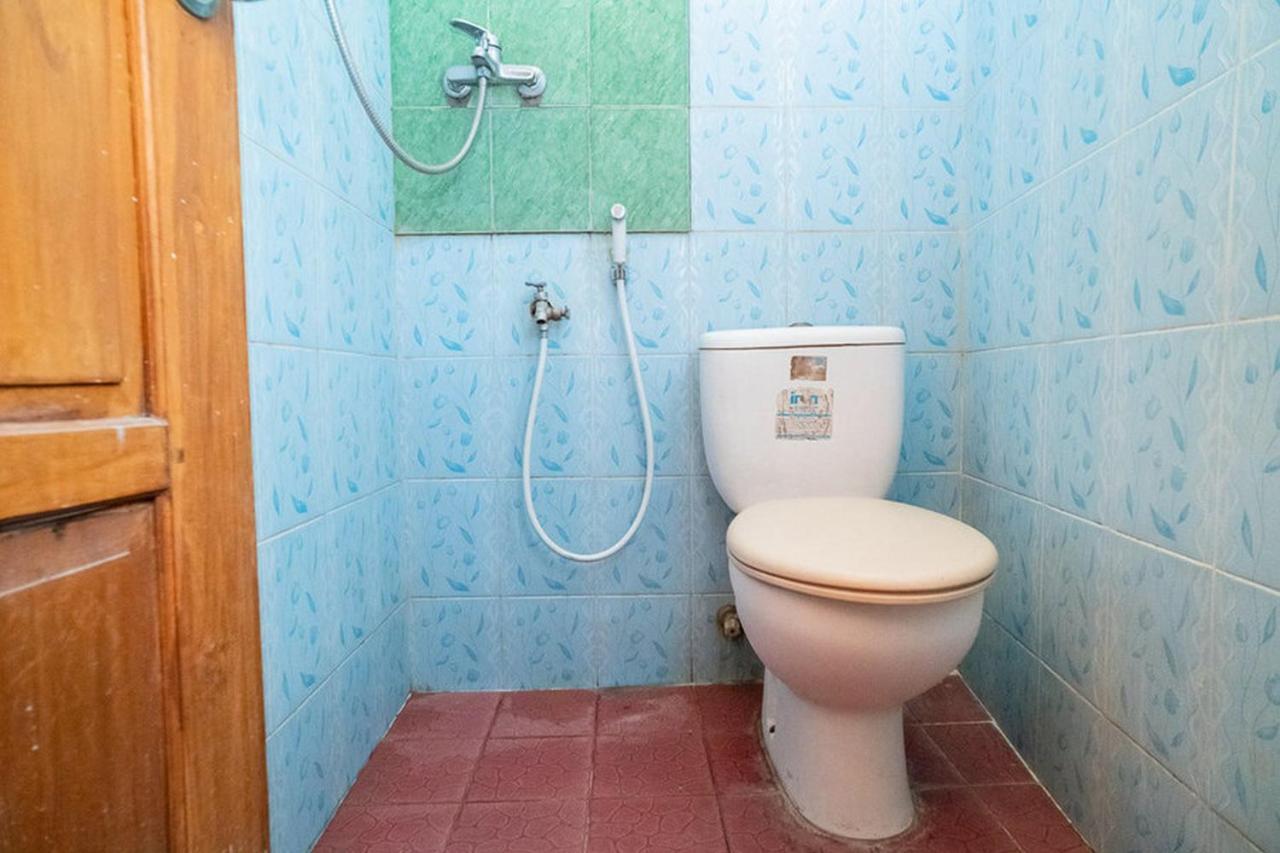 Pulauberayan Jotel Guest House Mitra Reddoorz מראה חיצוני תמונה