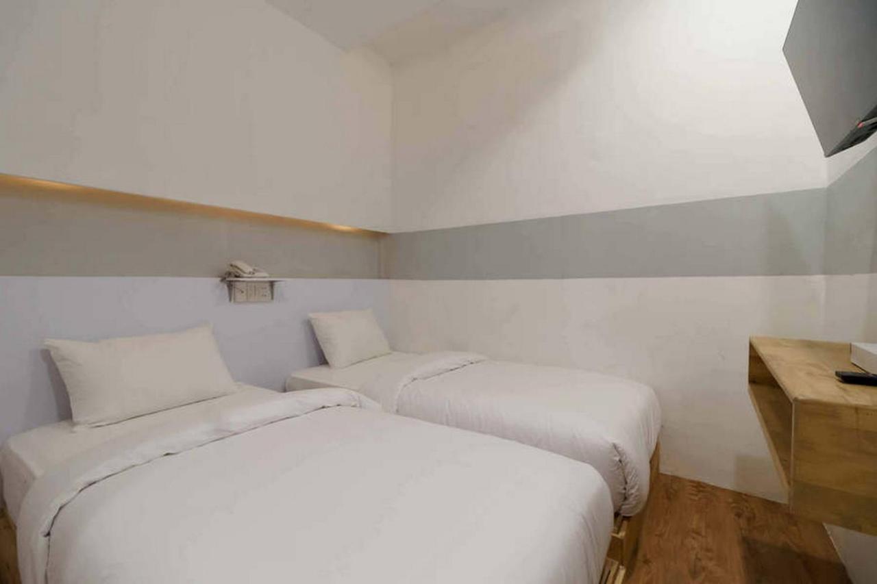 Pulauberayan Jotel Guest House Mitra Reddoorz מראה חיצוני תמונה