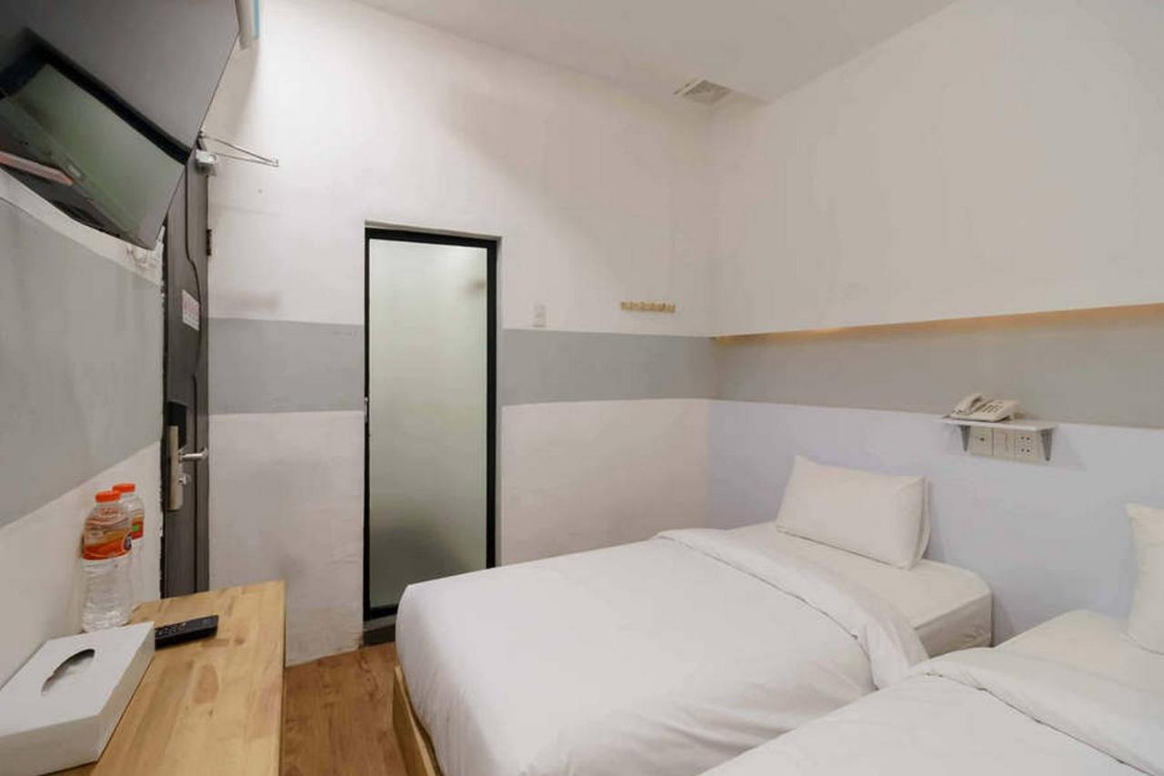 Pulauberayan Jotel Guest House Mitra Reddoorz מראה חיצוני תמונה